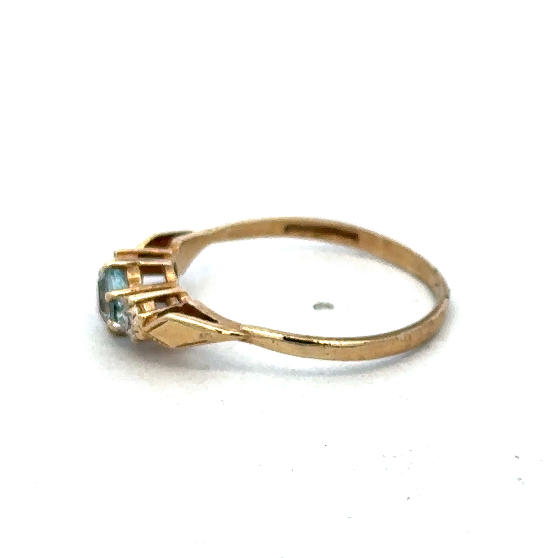 9ct yellow gold diamond ring by Reeves and Sons featuring sparkling diamonds and a elegant design.