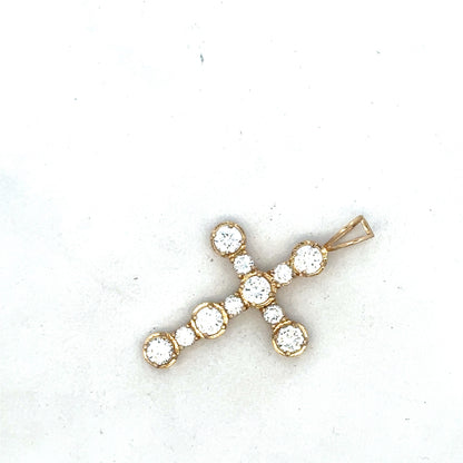 9ct yellow gold cross pendant from Reeves and Sons, featuring a detailed religious symbol design.