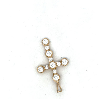 9ct yellow gold cross pendant by Reeves and Sons, featuring a detailed religious symbol on a chain.