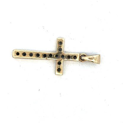 9ct yellow gold cross pendant by Reeves and Sons, showcasing a detailed religious jewelry design.