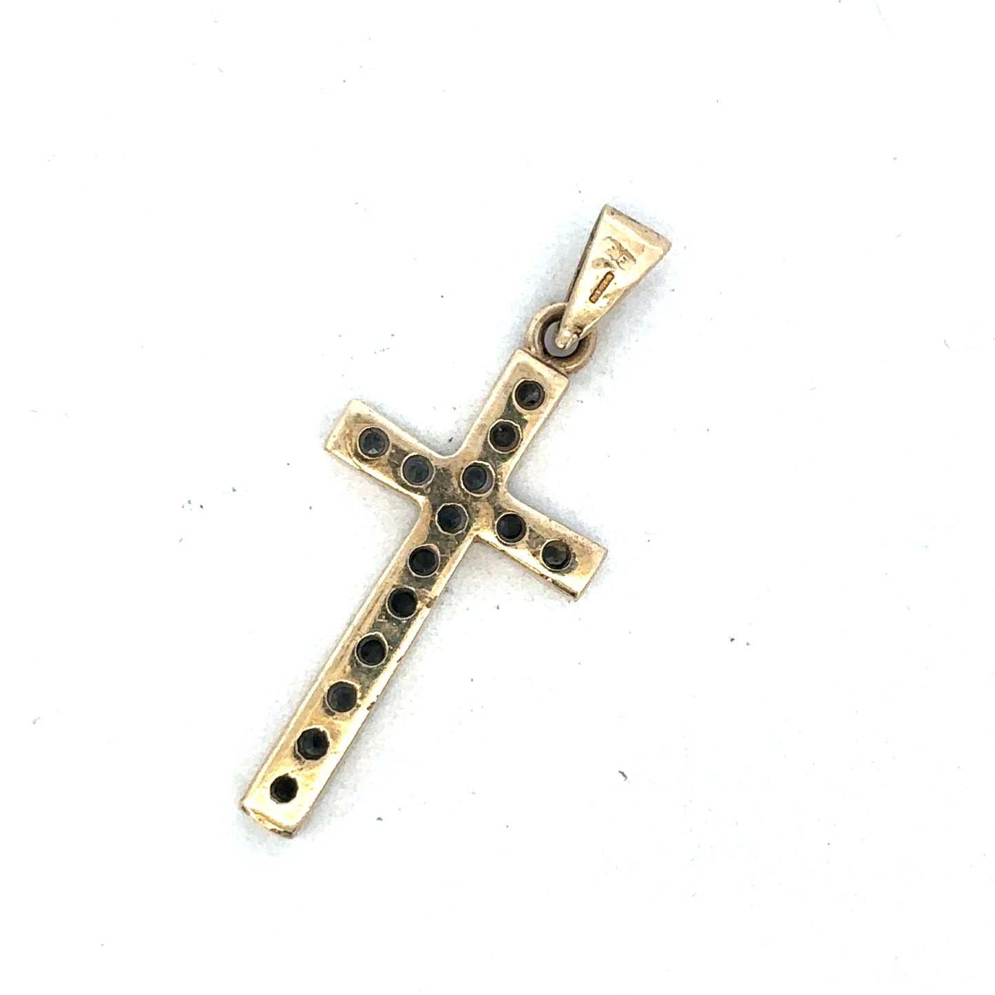 9ct yellow gold cross pendant by Reeves and Sons, featuring a detailed design, displayed on a neutral background.