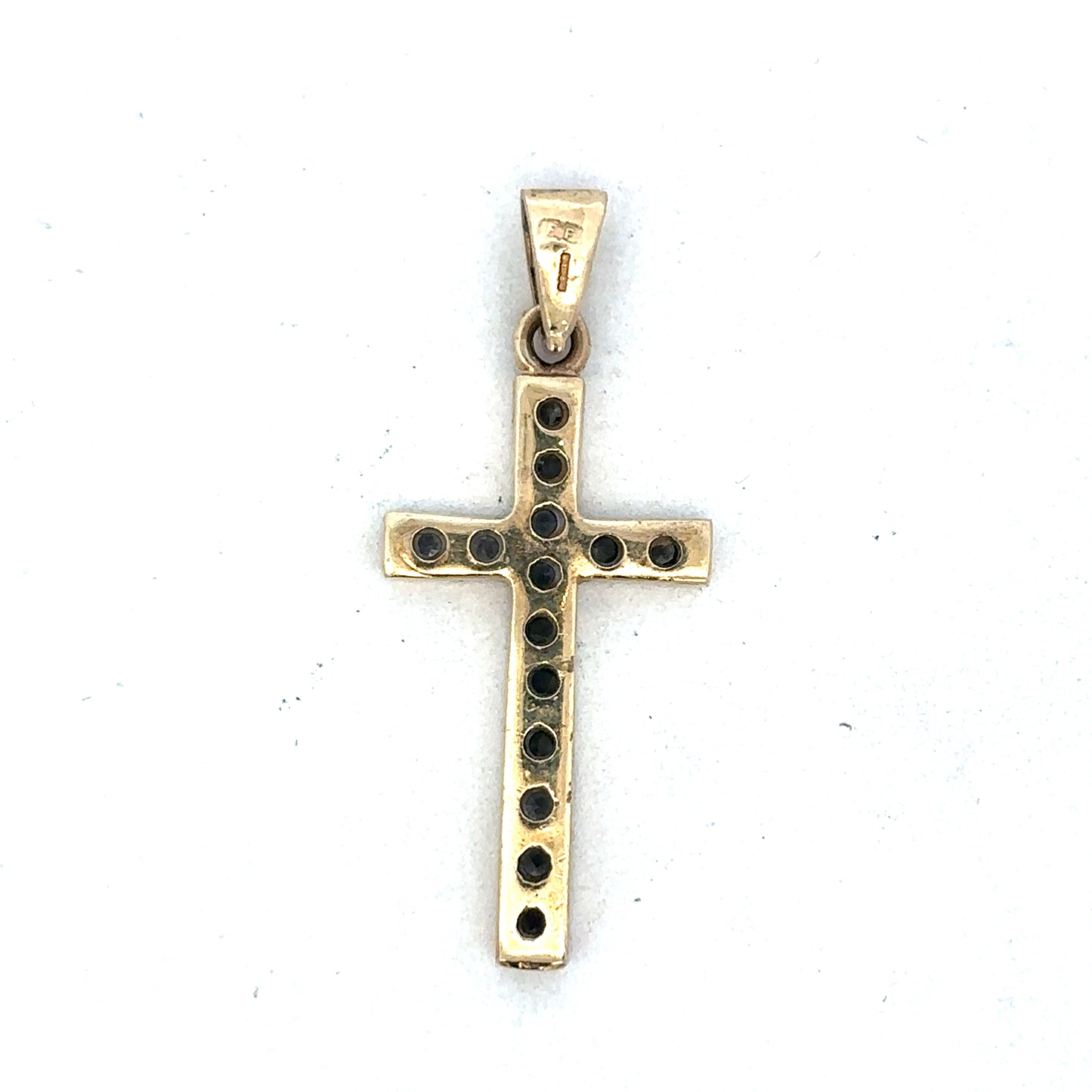 9ct yellow gold cross pendant by Reeves and Sons, showcasing a detailed religious jewelry design.