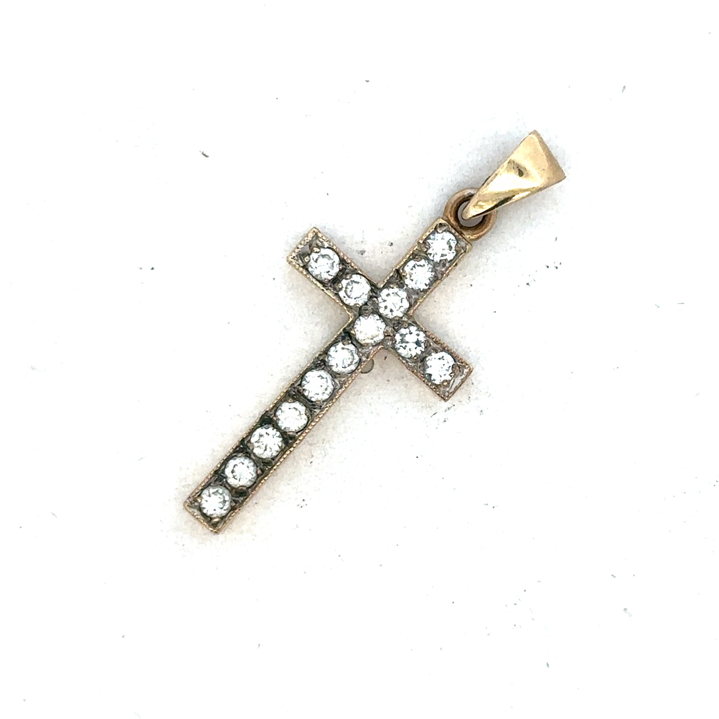 9ct yellow gold cross pendant by Reeves and Sons, featuring a simple and elegant design with a polished finish.