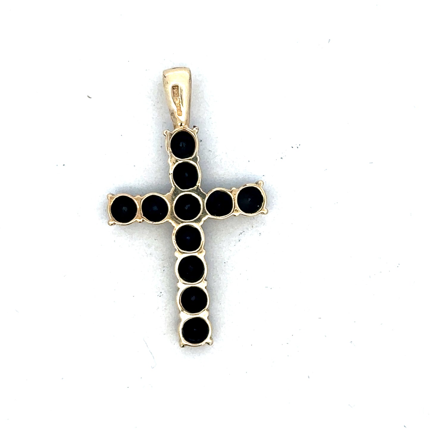 9ct yellow gold cross pendant by Reeves and Sons, showcasing a detailed pendant with polished finish and classic religious design.