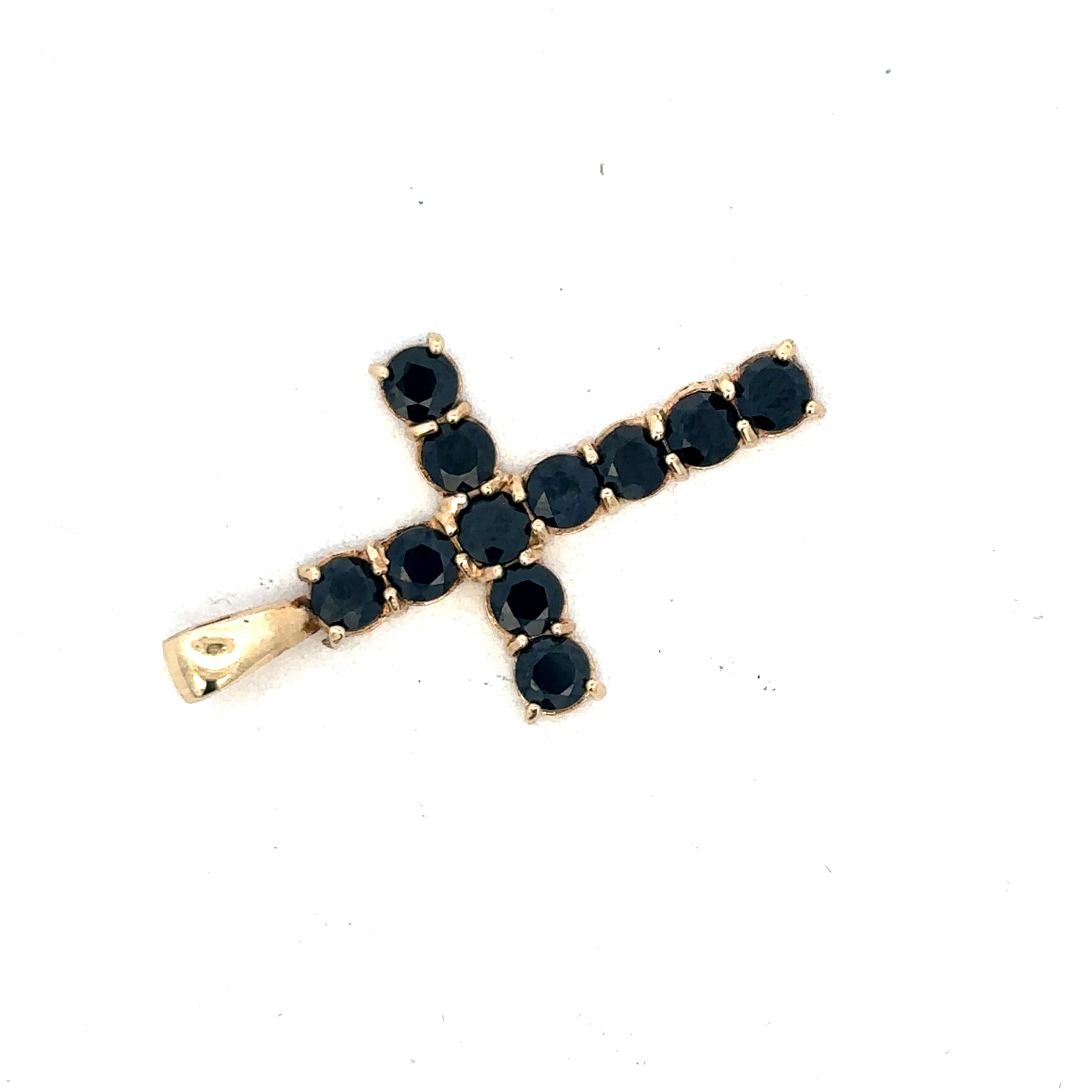 9ct yellow gold cross pendant by Reeves and Sons, featuring a detailed religious symbol design.