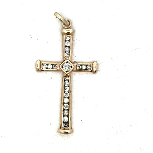 9ct yellow gold diamond cross pendant by Reeves and Sons, showcasing a detailed cross design with sparkling diamonds.