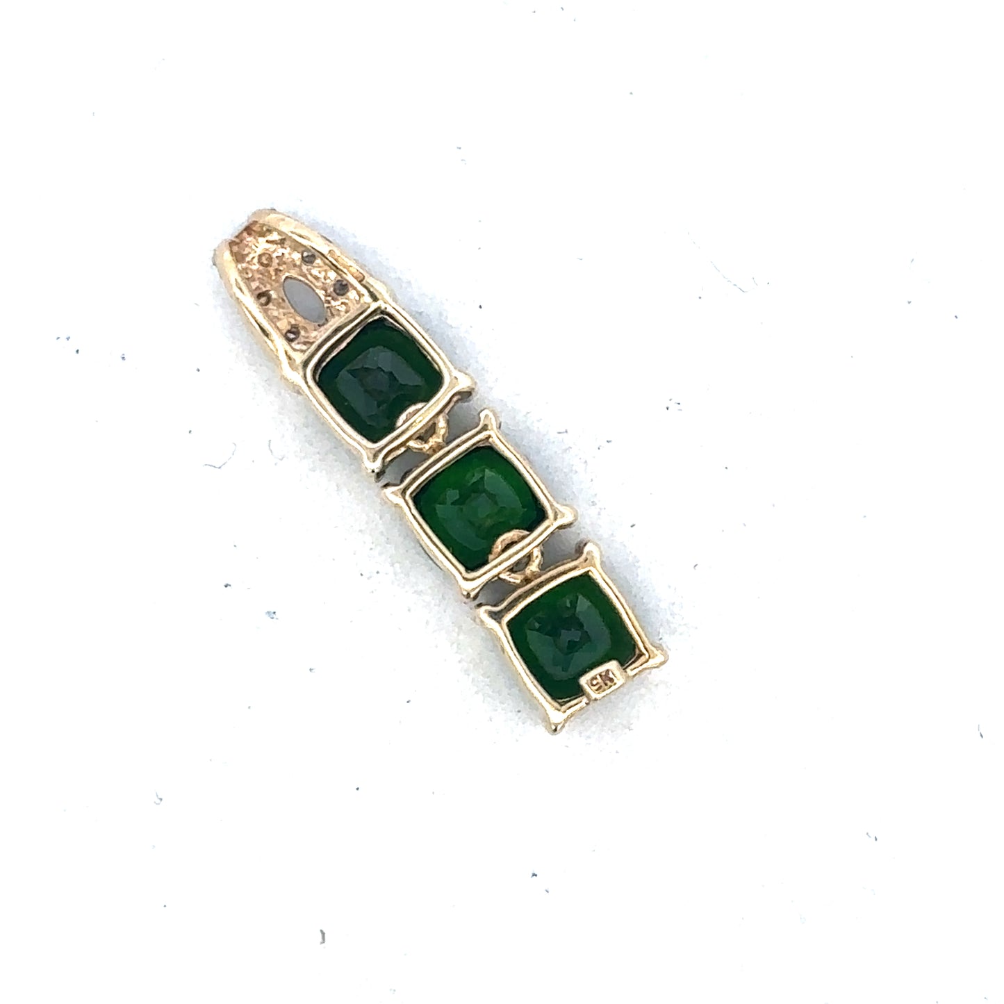 9ct yellow gold diamond pendant by Reeves and Sons, featuring a sparkling diamond set in a elegant pendant design.