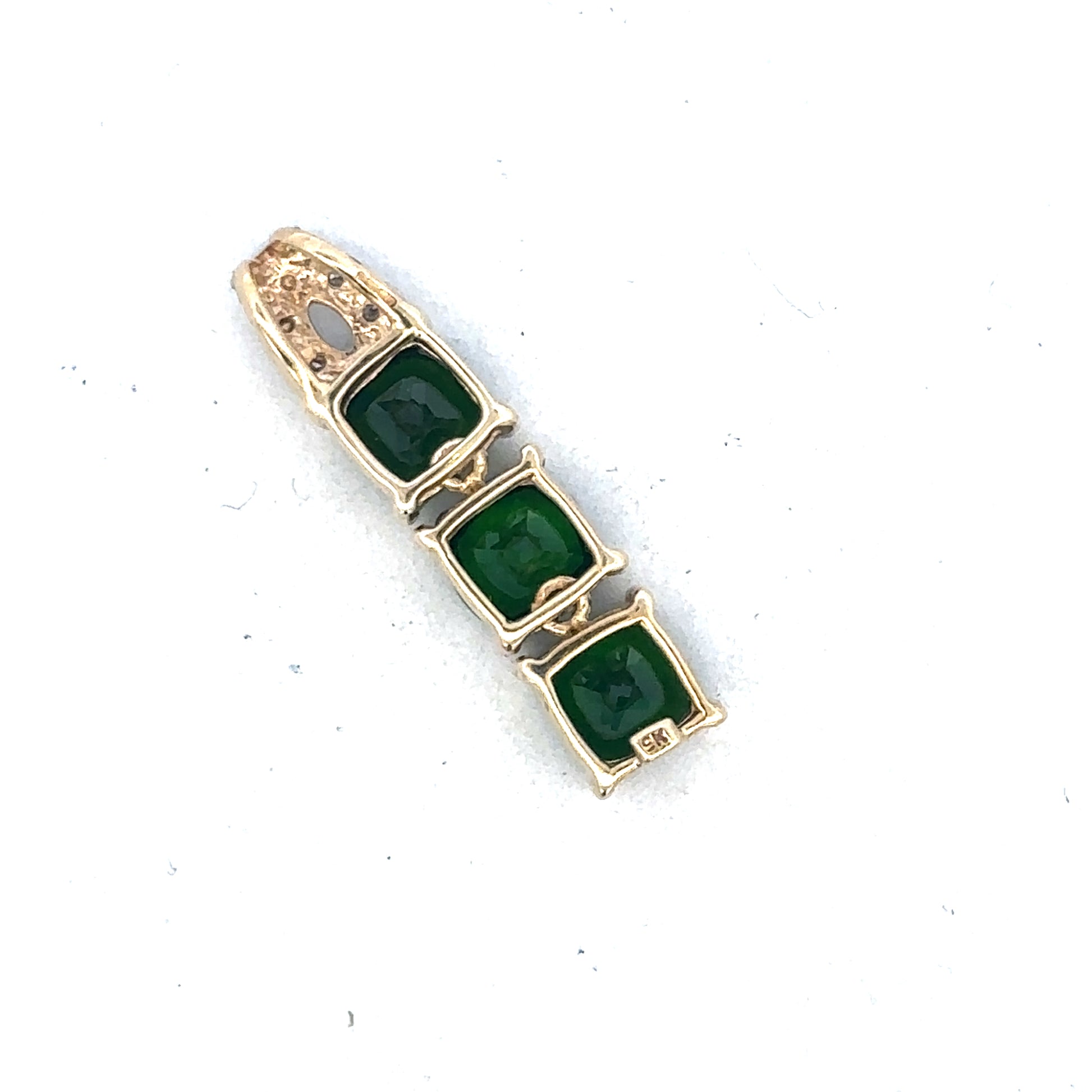 9ct yellow gold diamond pendant by Reeves and Sons, featuring a sparkling diamond set in a elegant pendant design.