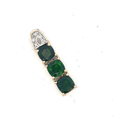 9ct yellow gold diamond pendant by Reeves and Sons, showcasing a sparkling diamond set in a elegant gold pendant.