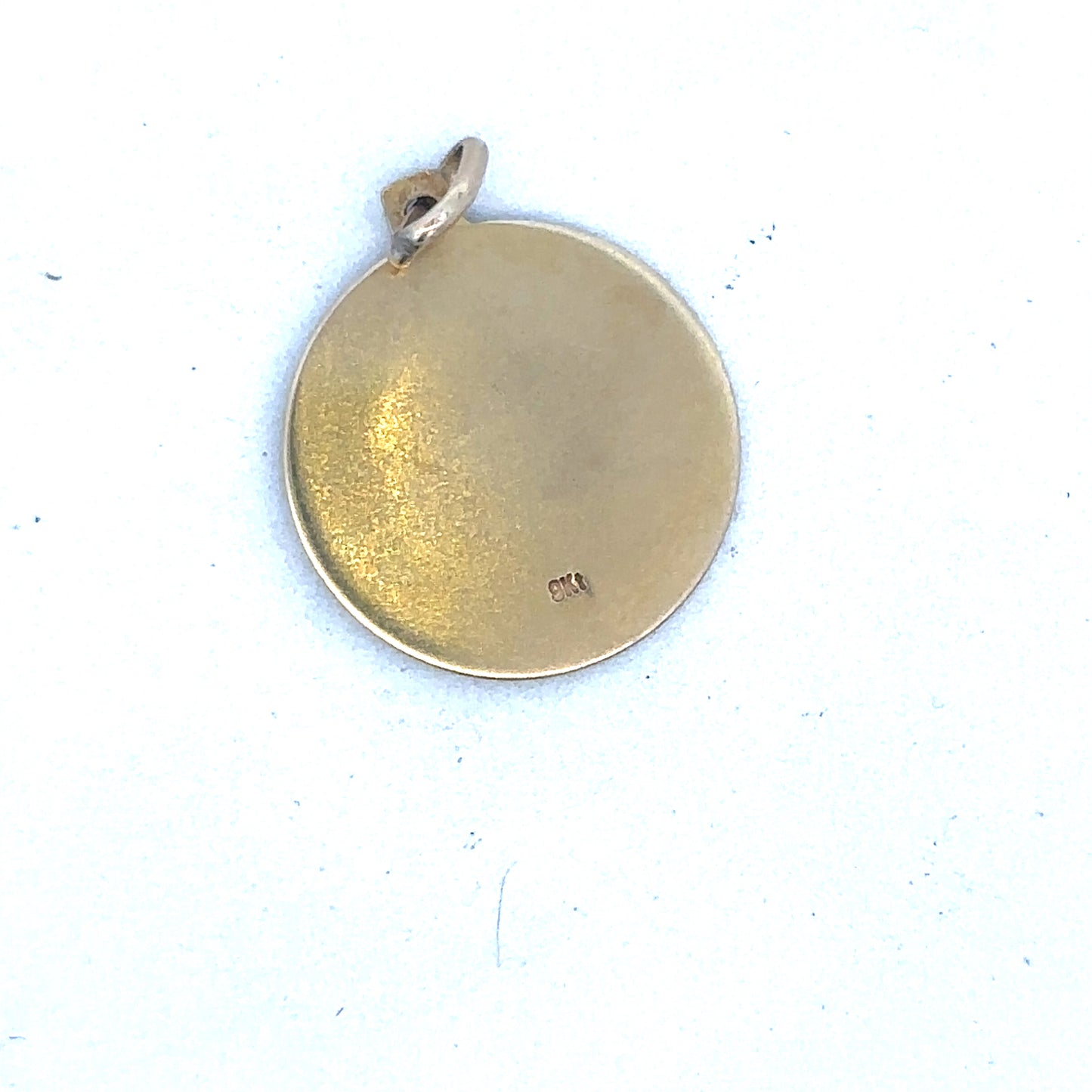 9ct yellow gold St Christopher pendant by Reeves and Sons, featuring detailed religious design on a polished gold chain.