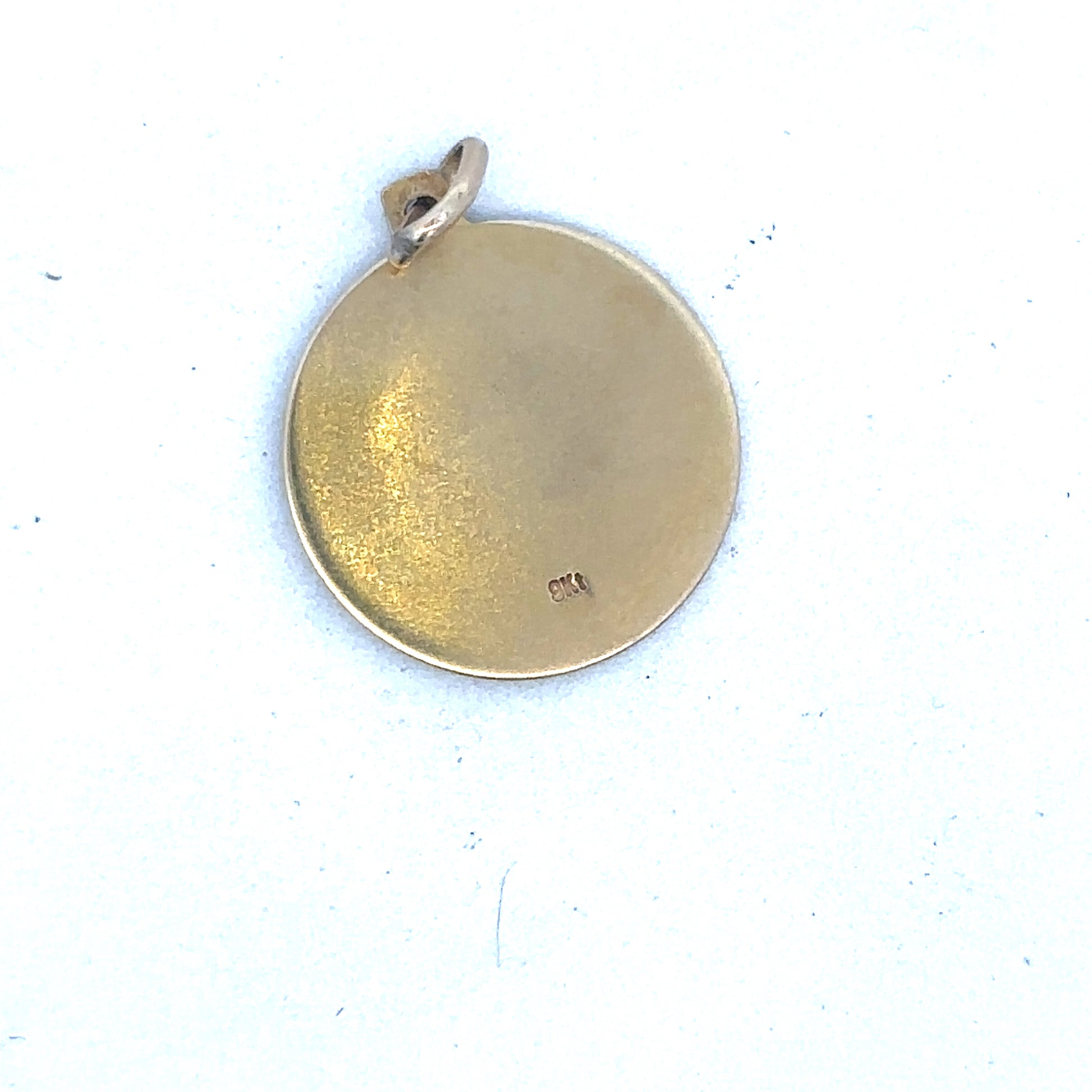 9ct yellow gold St Christopher pendant by Reeves and Sons, featuring detailed religious design on a polished gold chain.