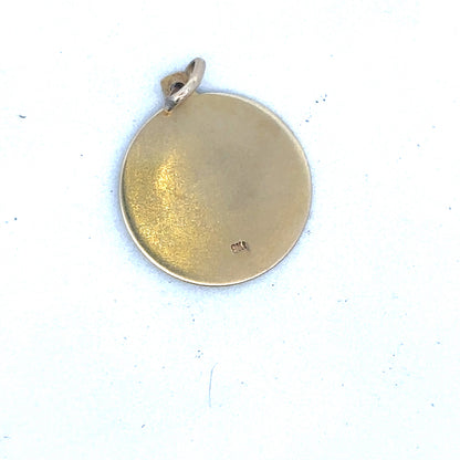 9ct yellow gold St Christopher pendant by Reeves and Sons, featuring detailed religious design on a polished gold chain.