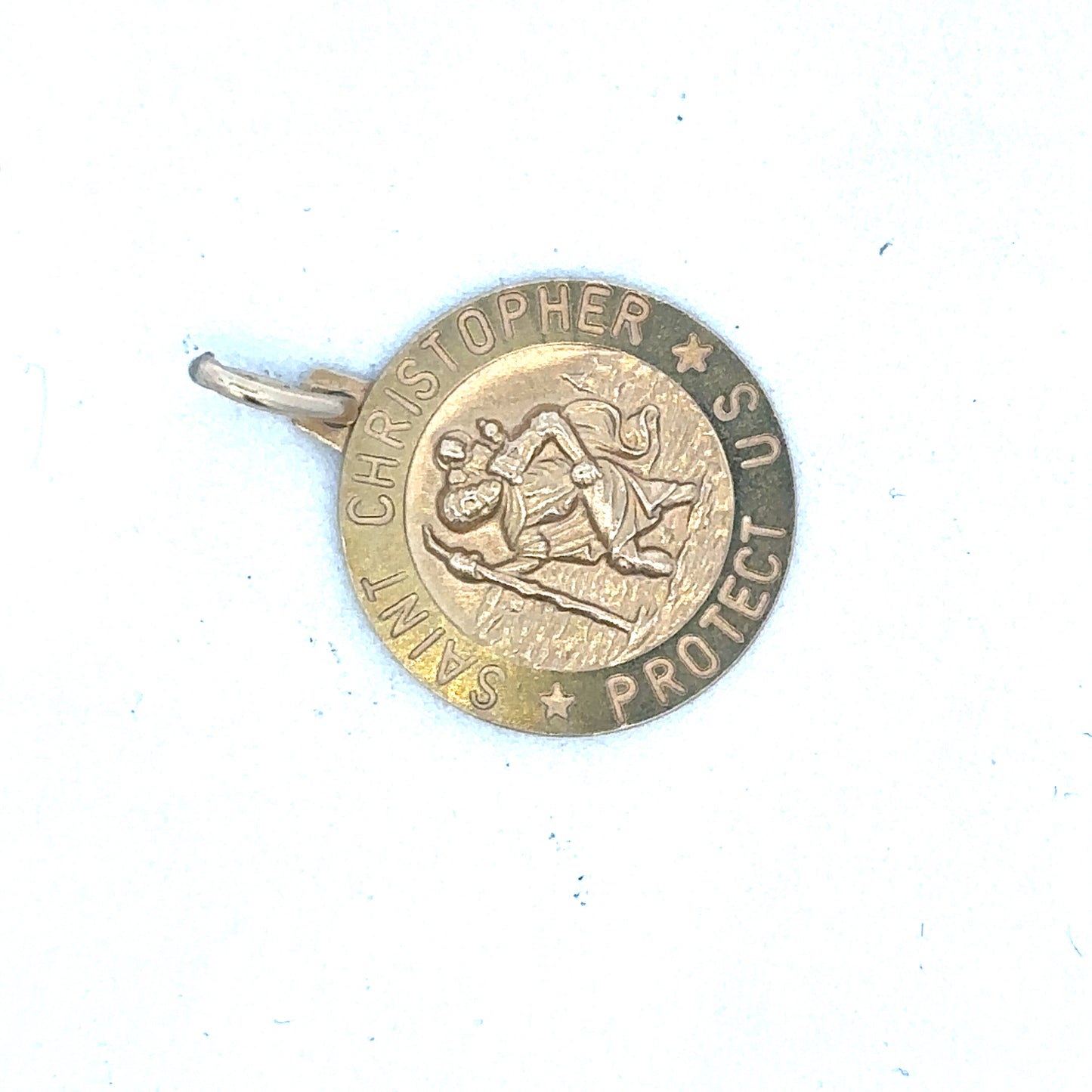 9ct yellow gold St Christopher pendant by Reeves and Sons, detailed religious medal with intricate design.