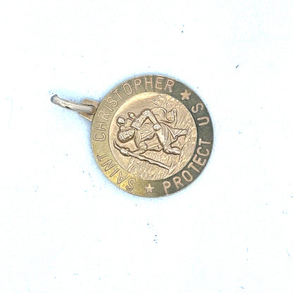 9ct yellow gold St Christopher pendant by Reeves and Sons, detailed religious medal with intricate design.