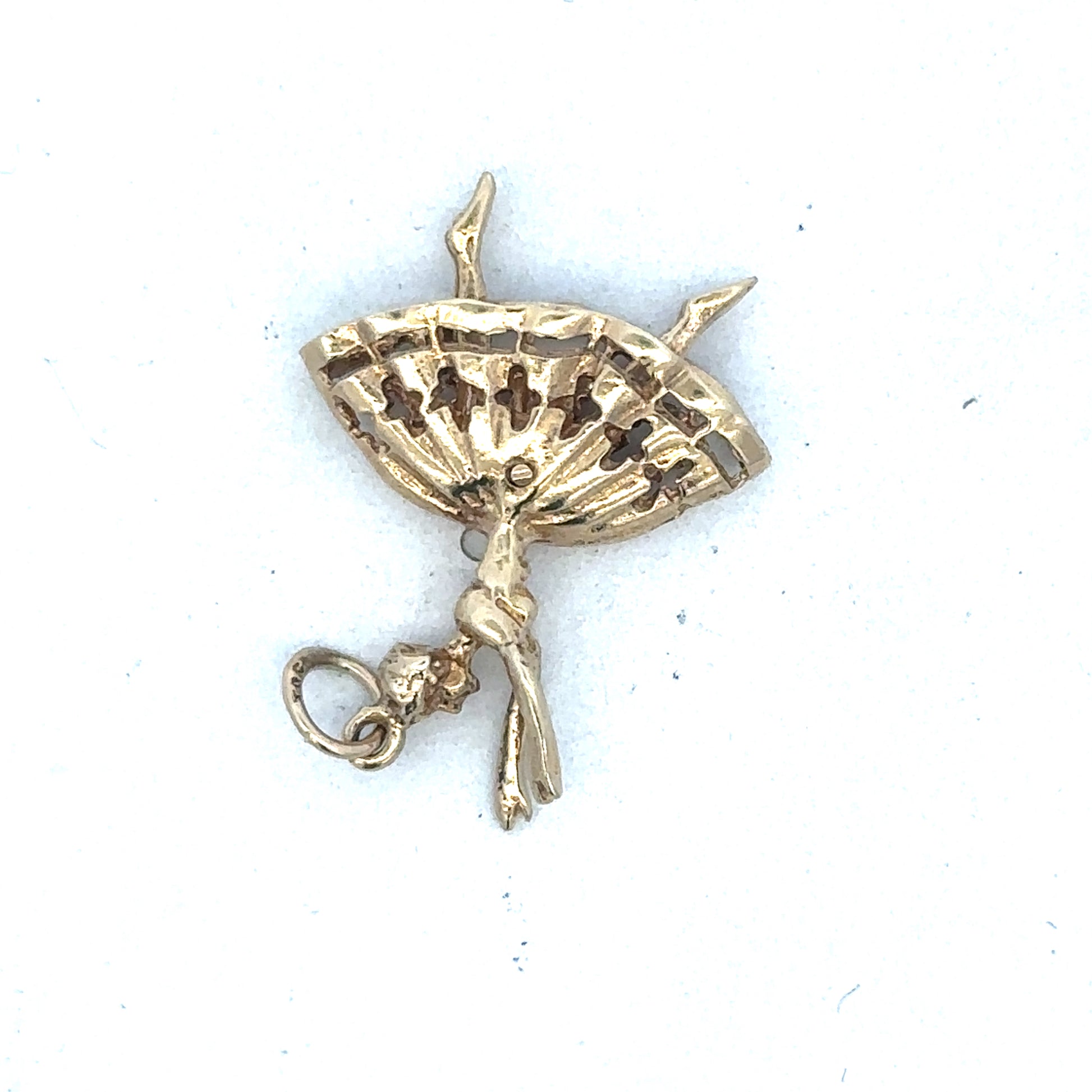 Yellow gold ballerina pendant by Reeves and Sons, showcasing a delicate dance-inspired jewelry design on a white background.