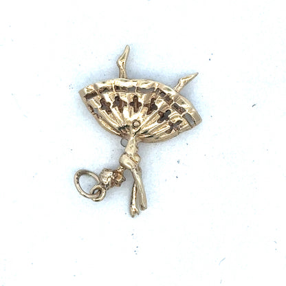 Yellow gold ballerina pendant by Reeves and Sons, showcasing a delicate dance-inspired jewelry design on a white background.