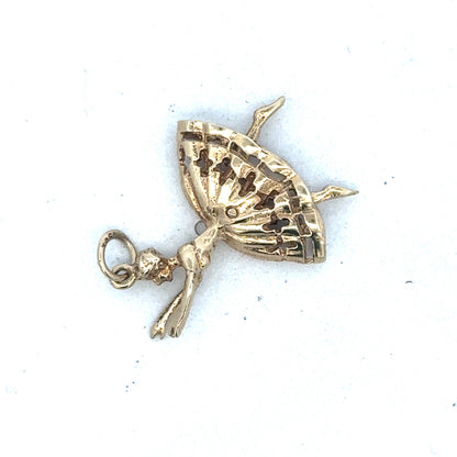 9ct yellow gold ballerina pendant by Reeves and Sons, featuring a delicate ballerina design on a chain.