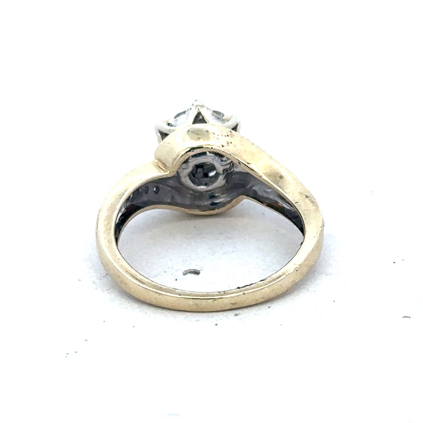 9ct yellow gold diamond ring by Reeves and Sons, featuring a sparkling diamond centerpiece and elegant band design.