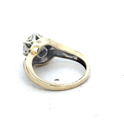 9ct yellow gold diamond ring by Reeves and Sons featuring sparkling diamonds and a classic design.