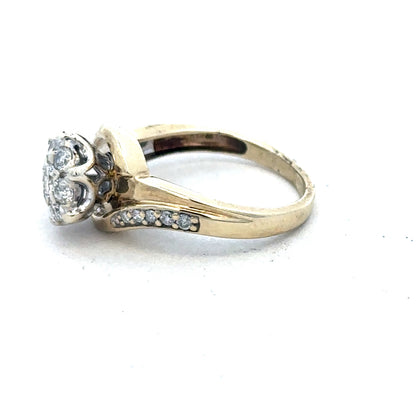 9ct yellow gold diamond ring by Reeves and Sons featuring a sparkling diamond centerpiece and elegant band design.