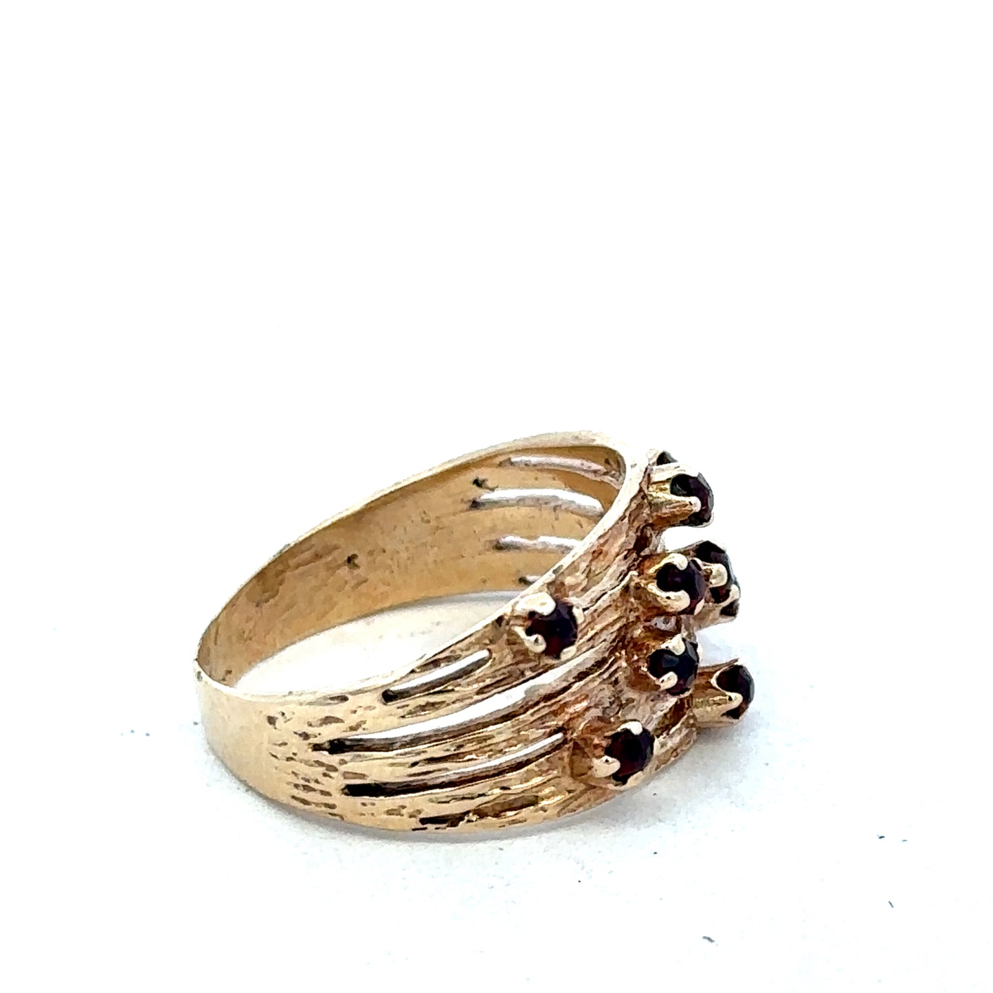 9ct yellow gold ring by Reeves and Sons, featuring a smooth polished band and elegant design.