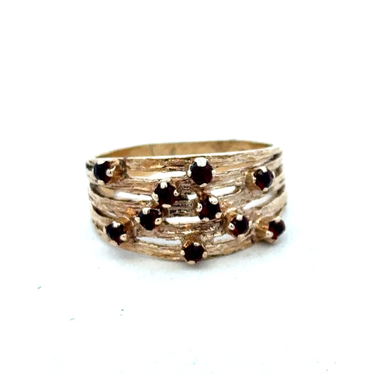 9ct yellow gold ring with smooth band, crafted by Reeves and Sons, shown in a close-up image.