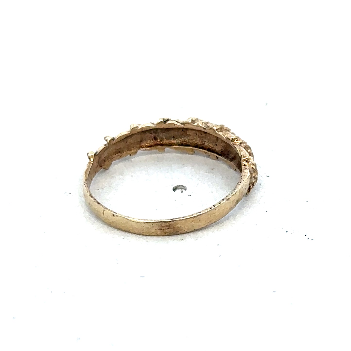 9ct yellow gold ring in size K with a smooth band, crafted by Reeves and Sons, shown on a white background