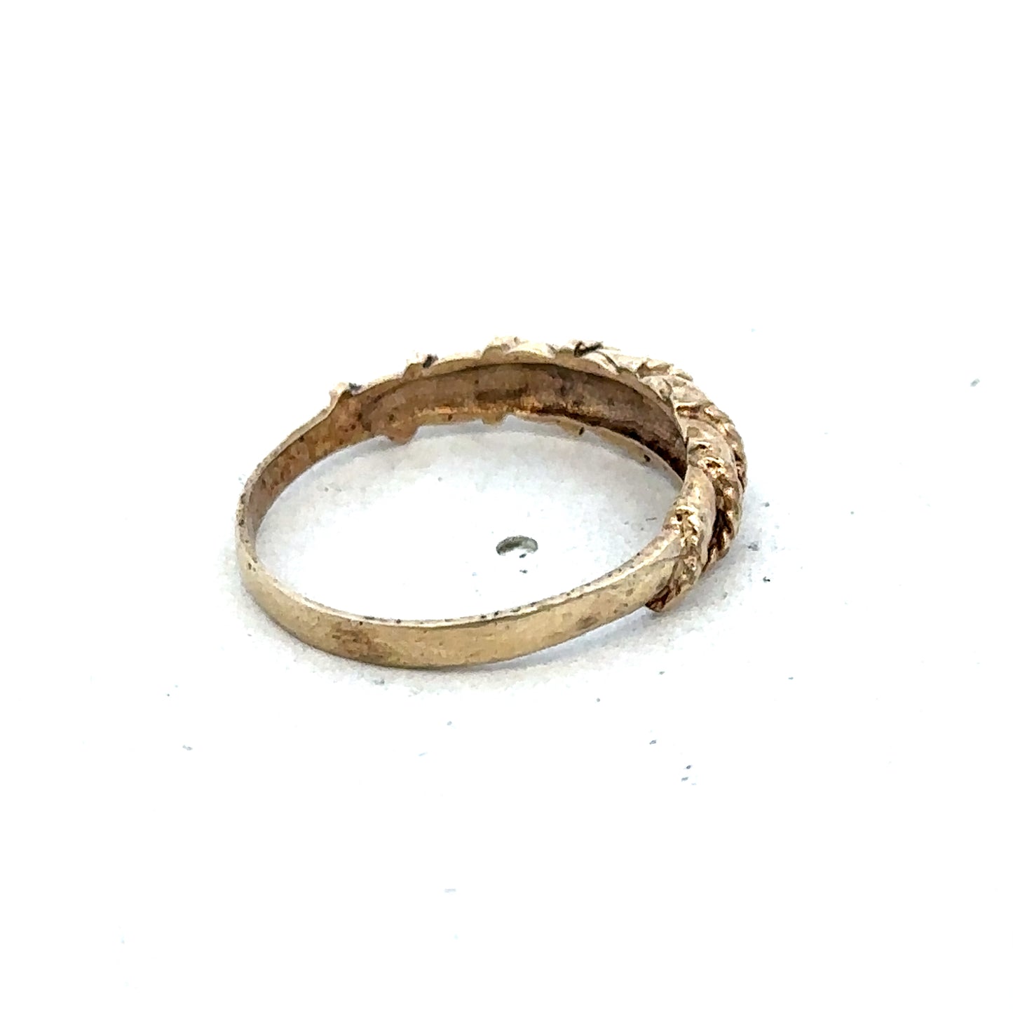 9ct yellow gold ring size K with a smooth band, crafted by Reeves and Sons, displayed on a neutral background.