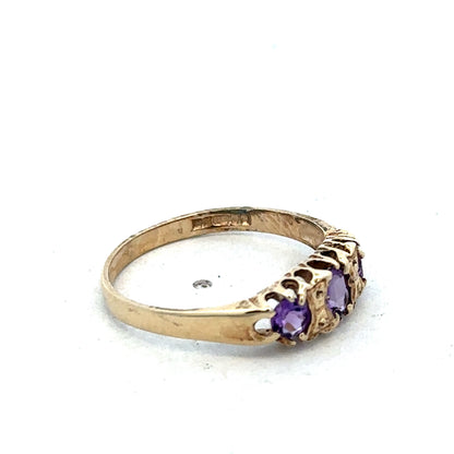 9ct yellow gold ring size N from Reeves and Sons, close-up of smooth band with polished finish and subtle shine.