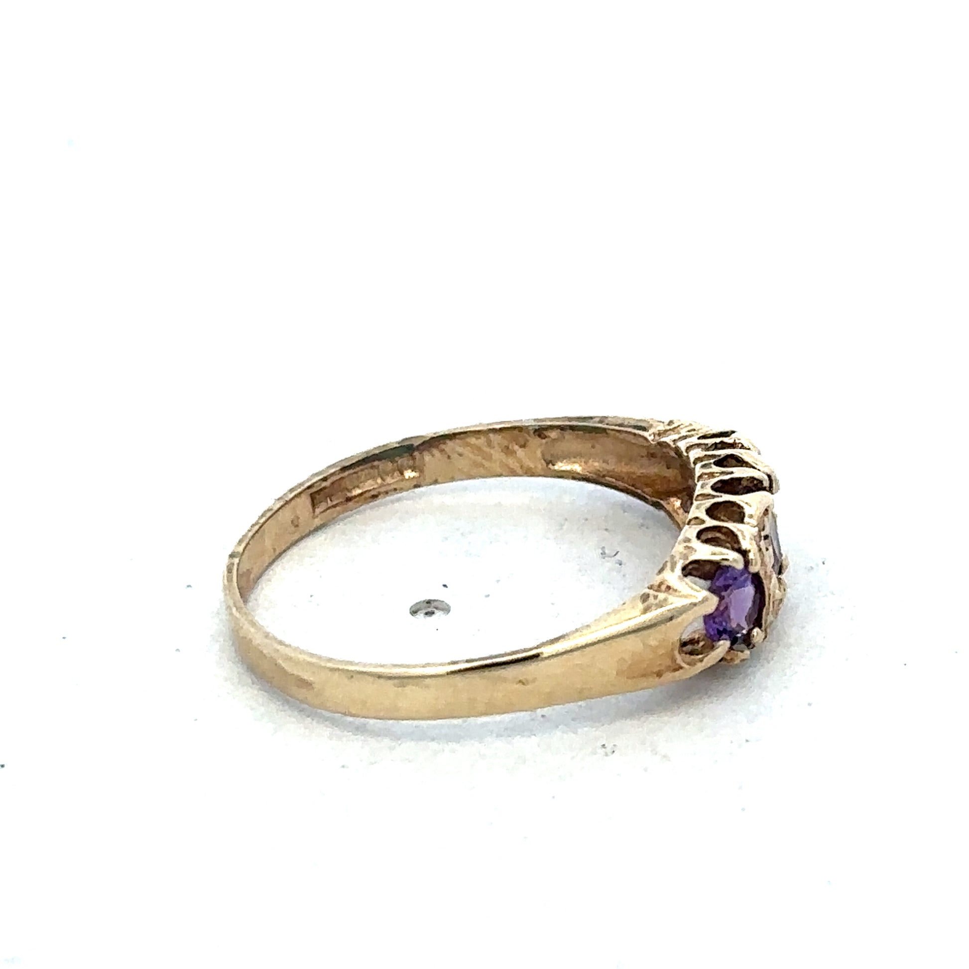 9ct yellow gold ring in size N with a smooth band, crafted by Reeves and Sons, displayed on a neutral background.