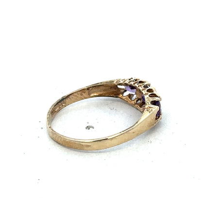 9ct yellow gold ring size N by Reeves and Sons, featuring a smooth polished band with a classic design.