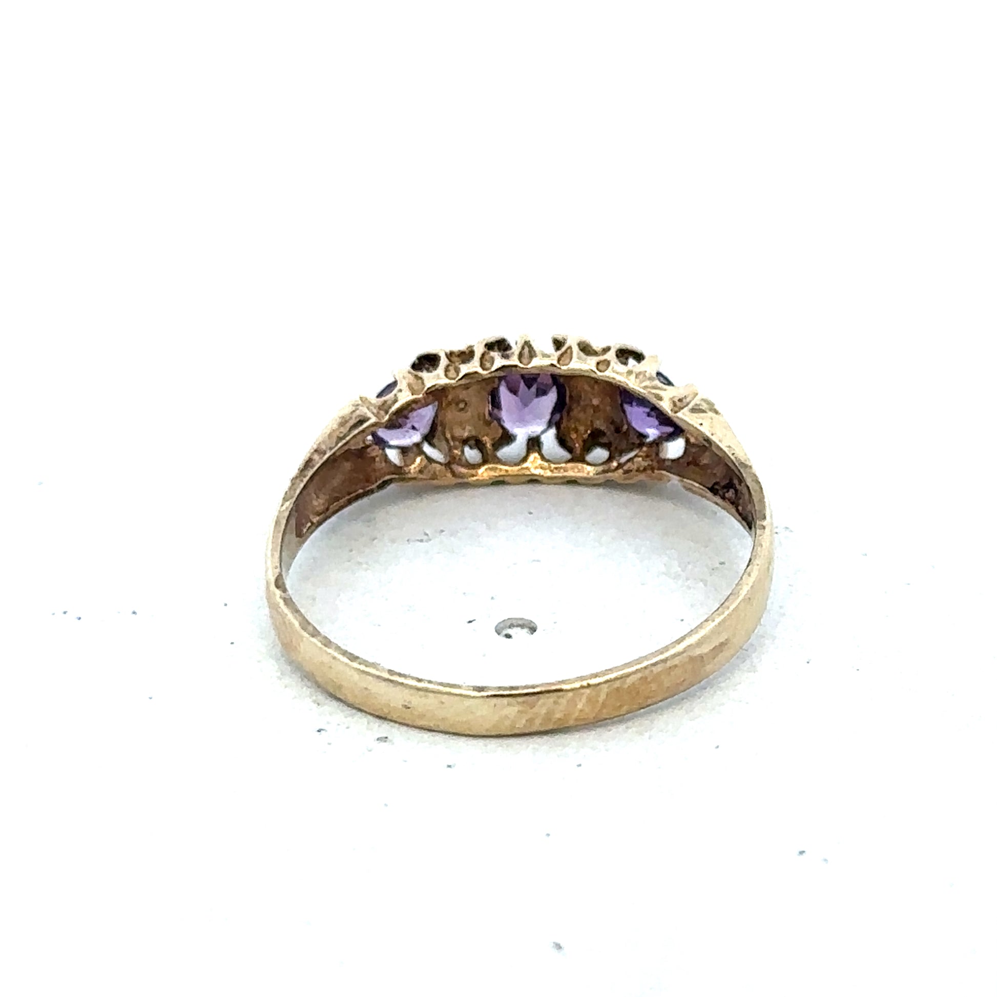 9ct yellow gold ring in size N with a smooth band, crafted by Reeves and Sons, shown on a plain background.