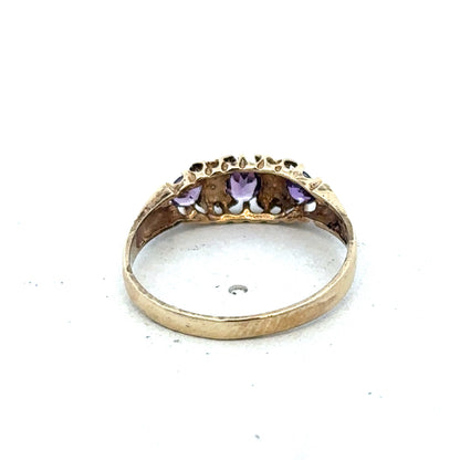 9ct yellow gold ring in size N with a smooth band, crafted by Reeves and Sons, shown on a plain background.