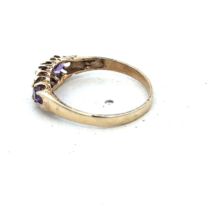 9ct yellow gold ring in size N by Reeves and Sons, featuring a smooth polished band and classic design.