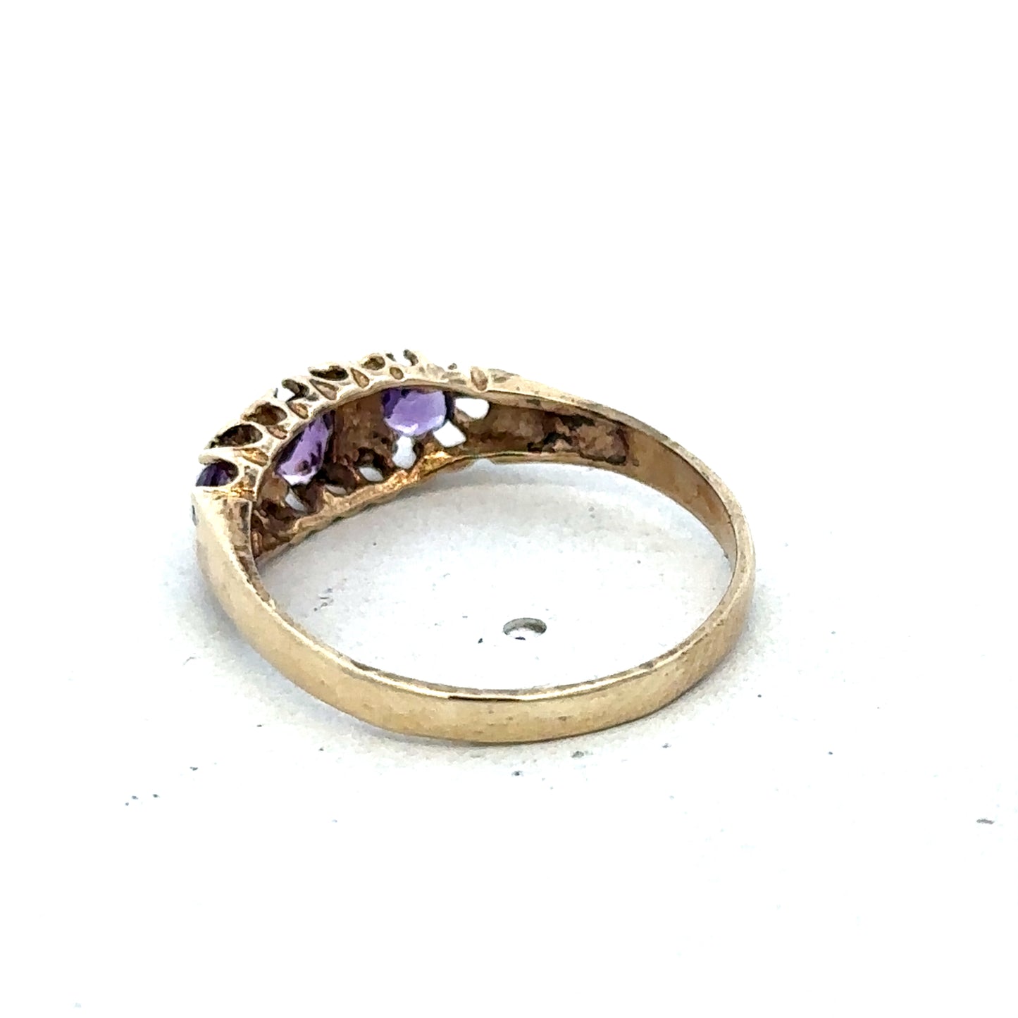 9ct yellow gold ring in size N with a smooth band, crafted by Reeves and Sons, shown on a plain background.