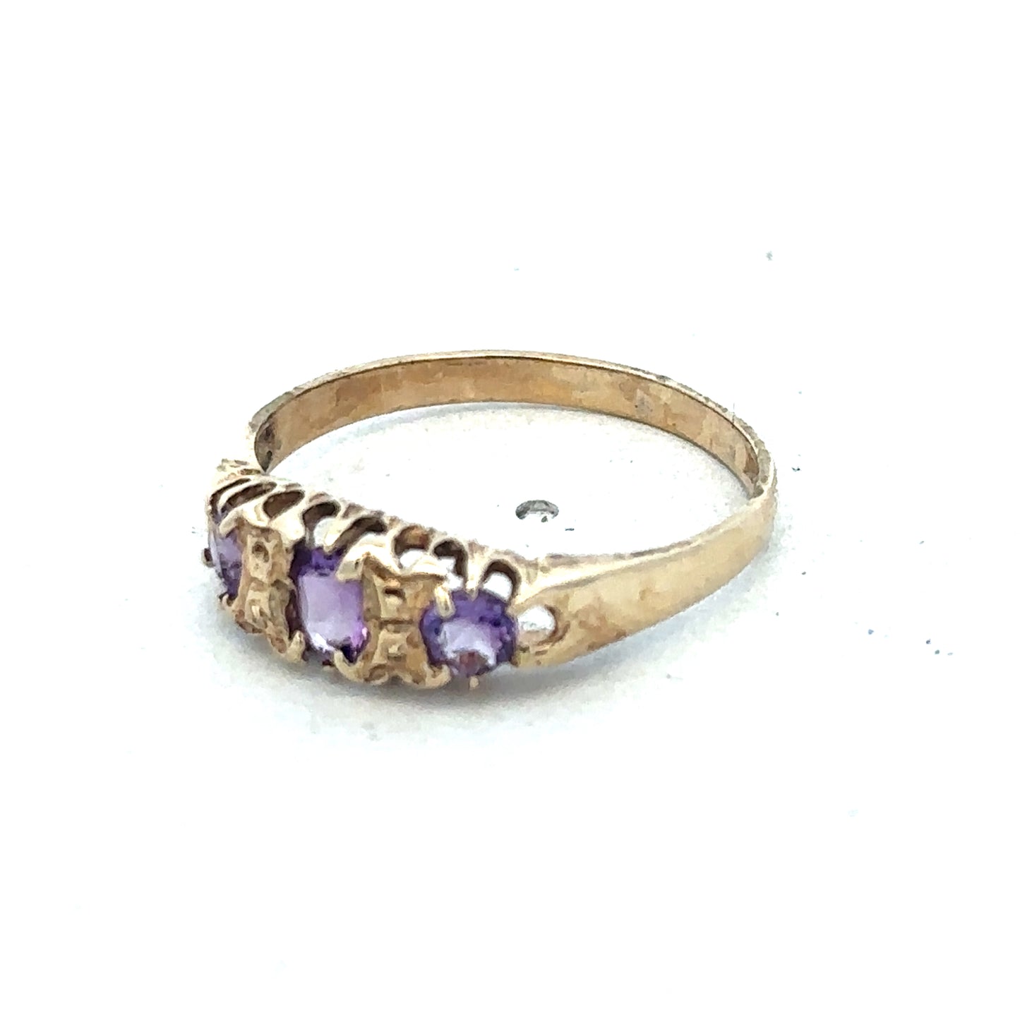 9ct yellow gold Reeves and Sons ring size N with a smooth, polished band, displayed on a plain background.