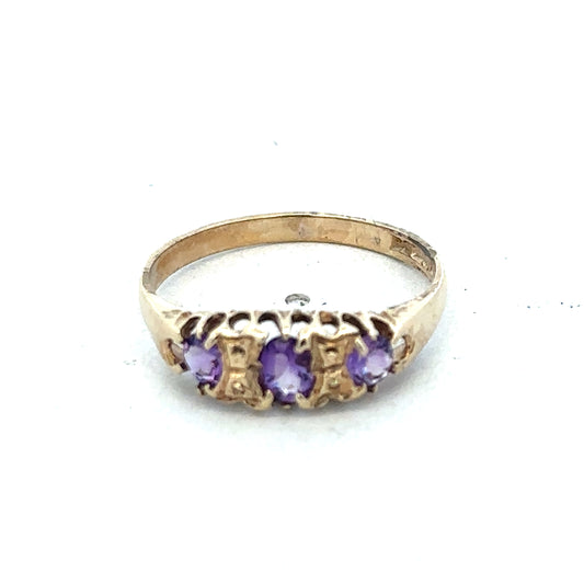 9ct yellow gold ring in size N with a smooth band, crafted by Reeves and Sons, displayed on a neutral background.