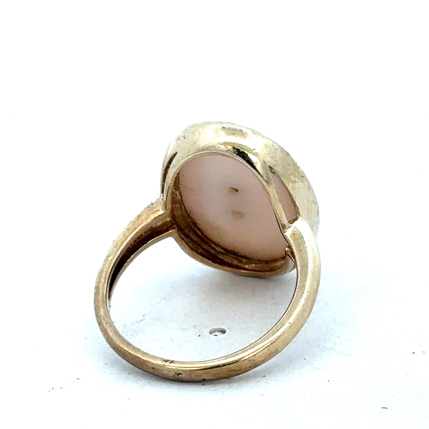 9ct yellow gold ring size N by Reeves and Sons, featuring a smooth polished band, shown close-up.
