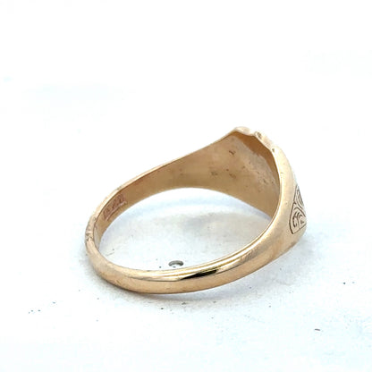 9ct yellow gold signet ring in size T with Reeves and Sons branding, featuring a polished, classic design.