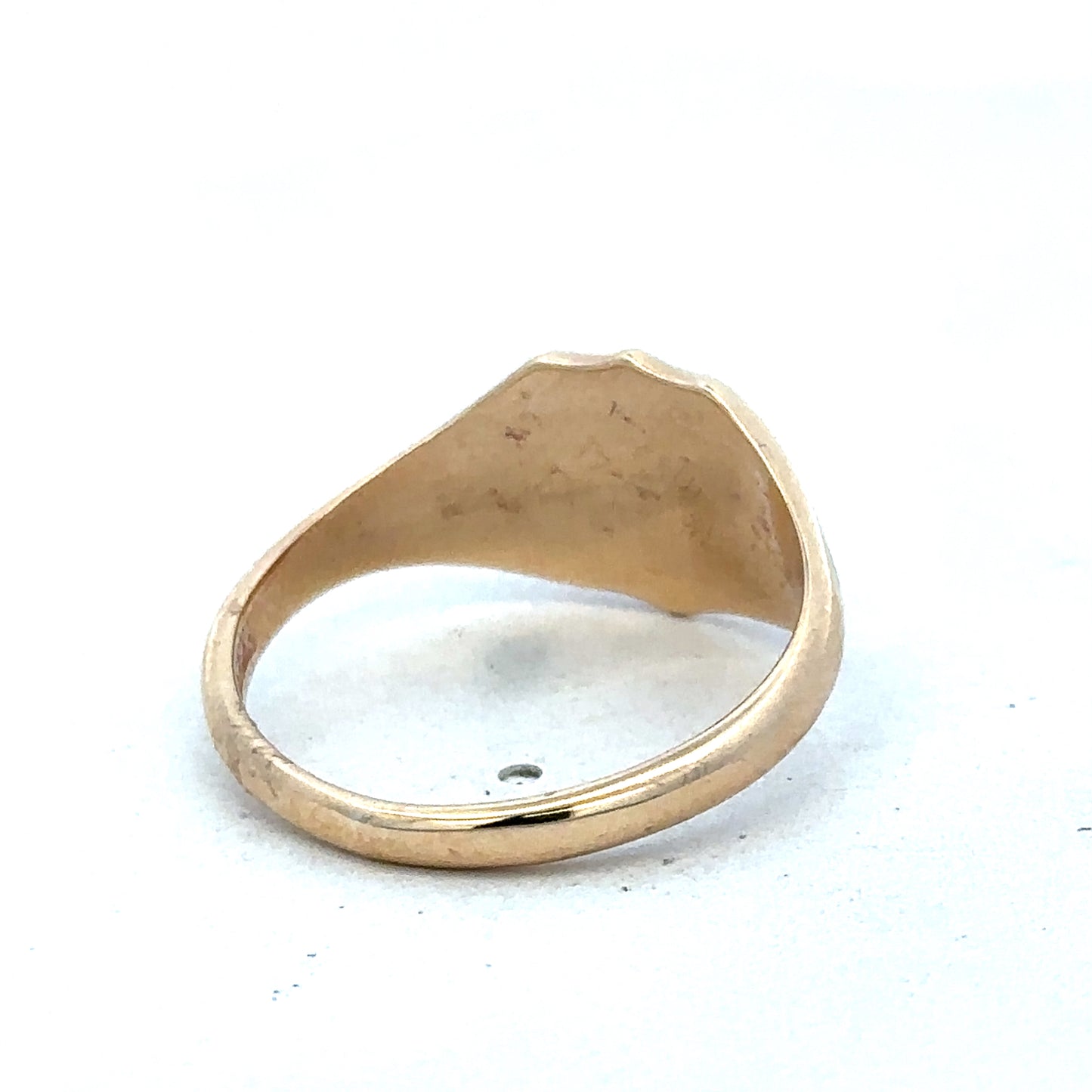 9ct yellow gold signet ring in size T with engraved face, crafted by Reeves and Sons.