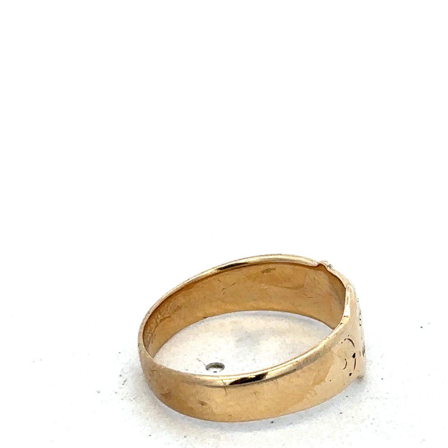 9ct yellow gold buckle ring in size L1/2, Reeves and Sons, with a polished buckle design and smooth band.