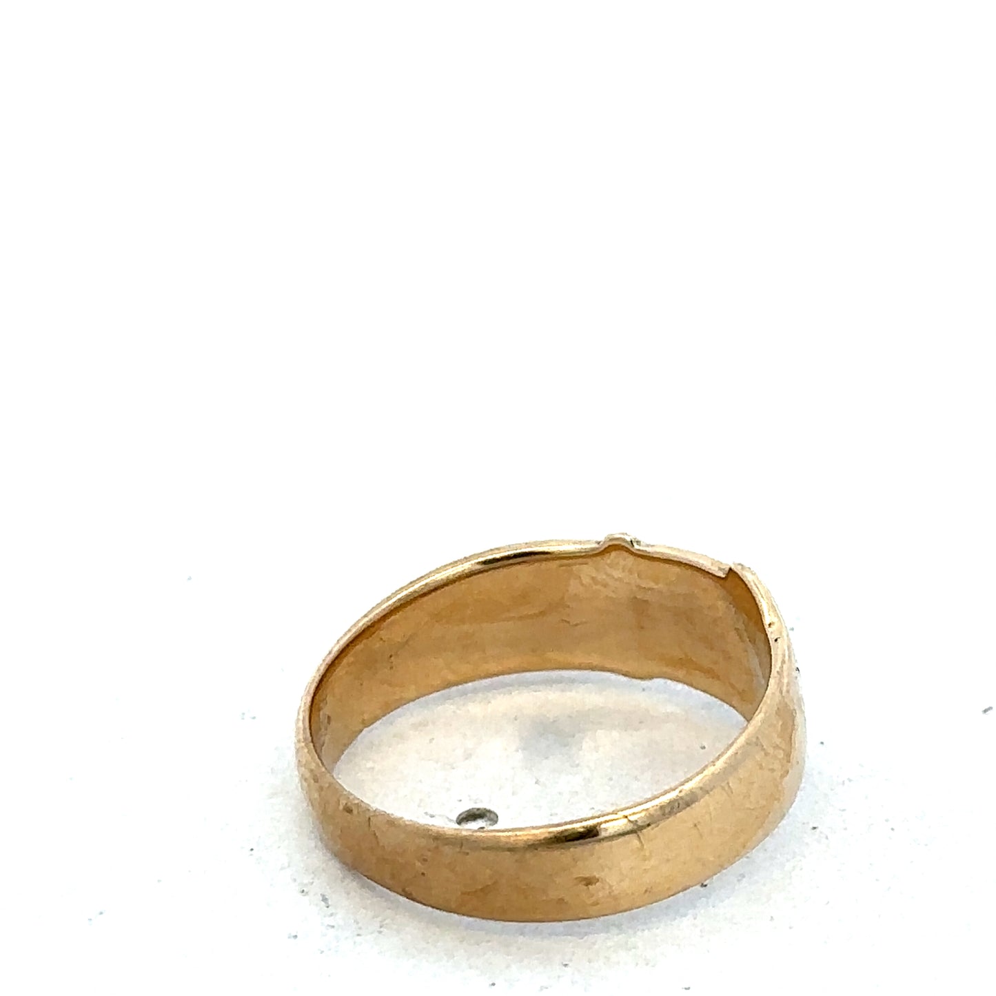 9ct yellow gold buckle ring, size L1/2, featuring a polished design, crafted by Reeves and Sons.