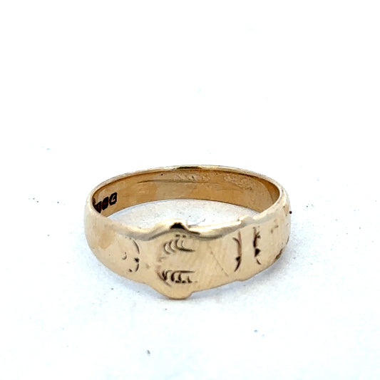 9ct yellow gold buckle ring size L1/2 from Reeves and Sons, featuring a polished gold band with a buckle design.