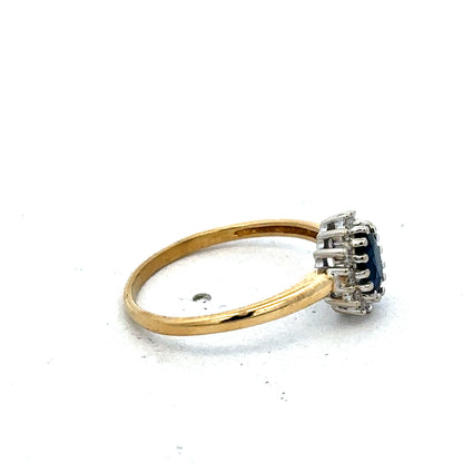 18ct yellow gold sapphire and diamond ring in size L1/2, featuring a detailed Reeves and Sons design and elegant gemstone setting.