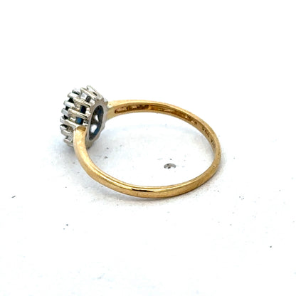 18ct yellow gold sapphire and diamond ring in size L1/2, featuring a classic Reeves and Sons design.