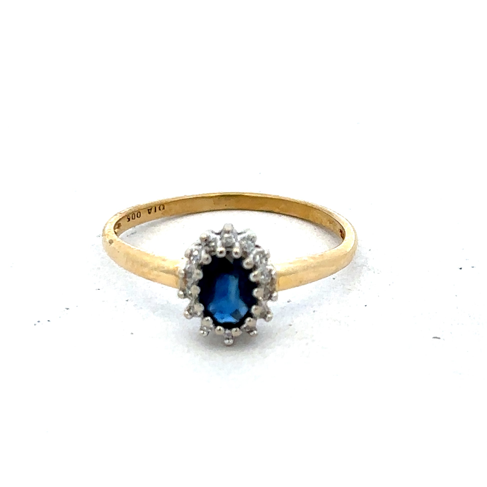 18ct yellow gold sapphire and diamond ring, size L1/2, featuring a central sapphire gemstone and sparkling diamonds, by Reeves and Sons.