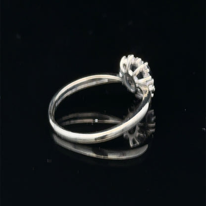 9ct white gold sapphire and diamond ring in size L by Reeves and Sons, featuring a central sapphire with diamond accents.