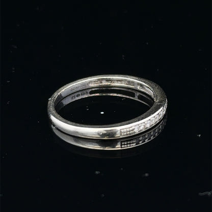 9ct white gold half eternity diamond ring with small sparkling diamonds, size N, by Reeves and Sons.