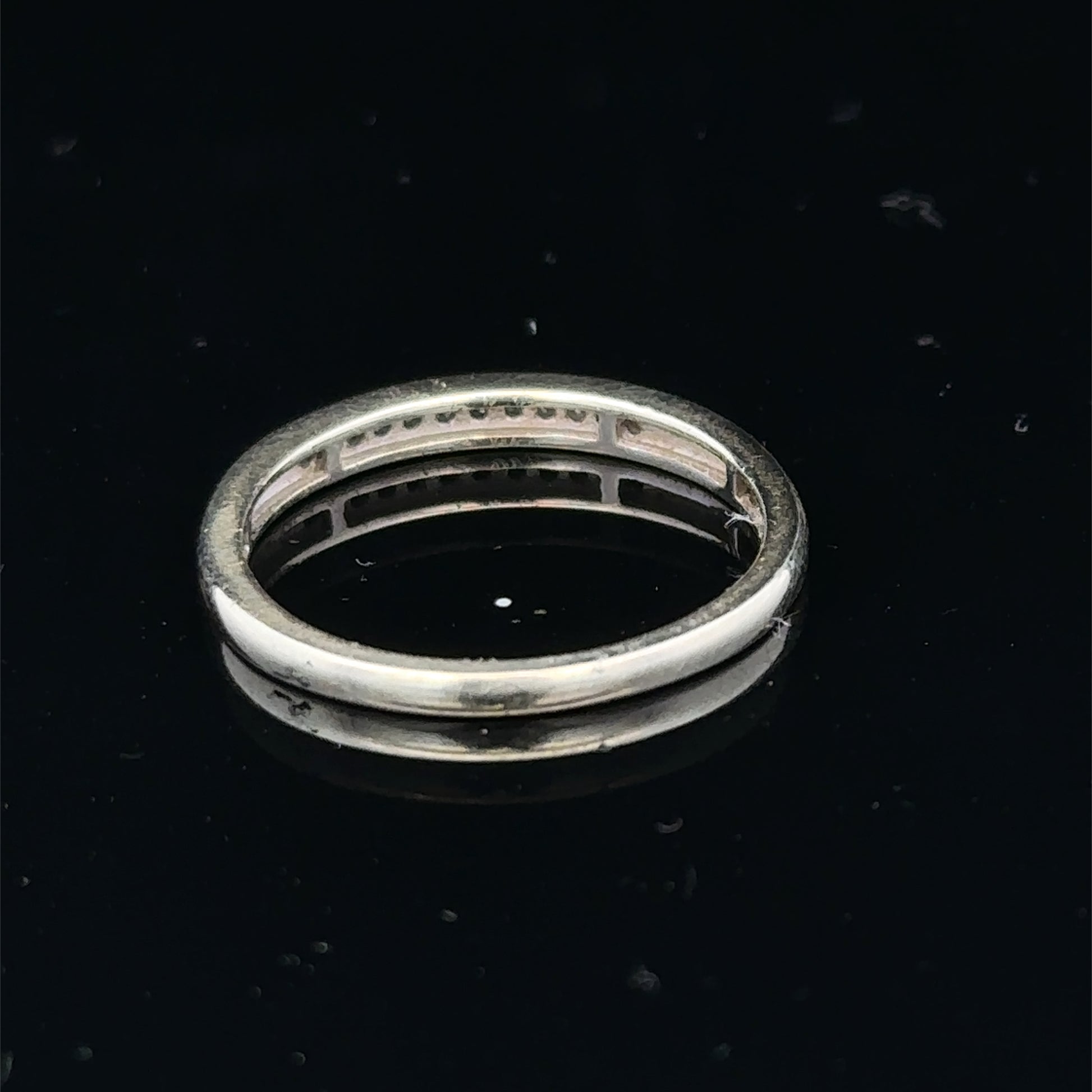9ct white gold half eternity diamond ring in size N with sparkling diamonds, crafted by Reeves and Sons.