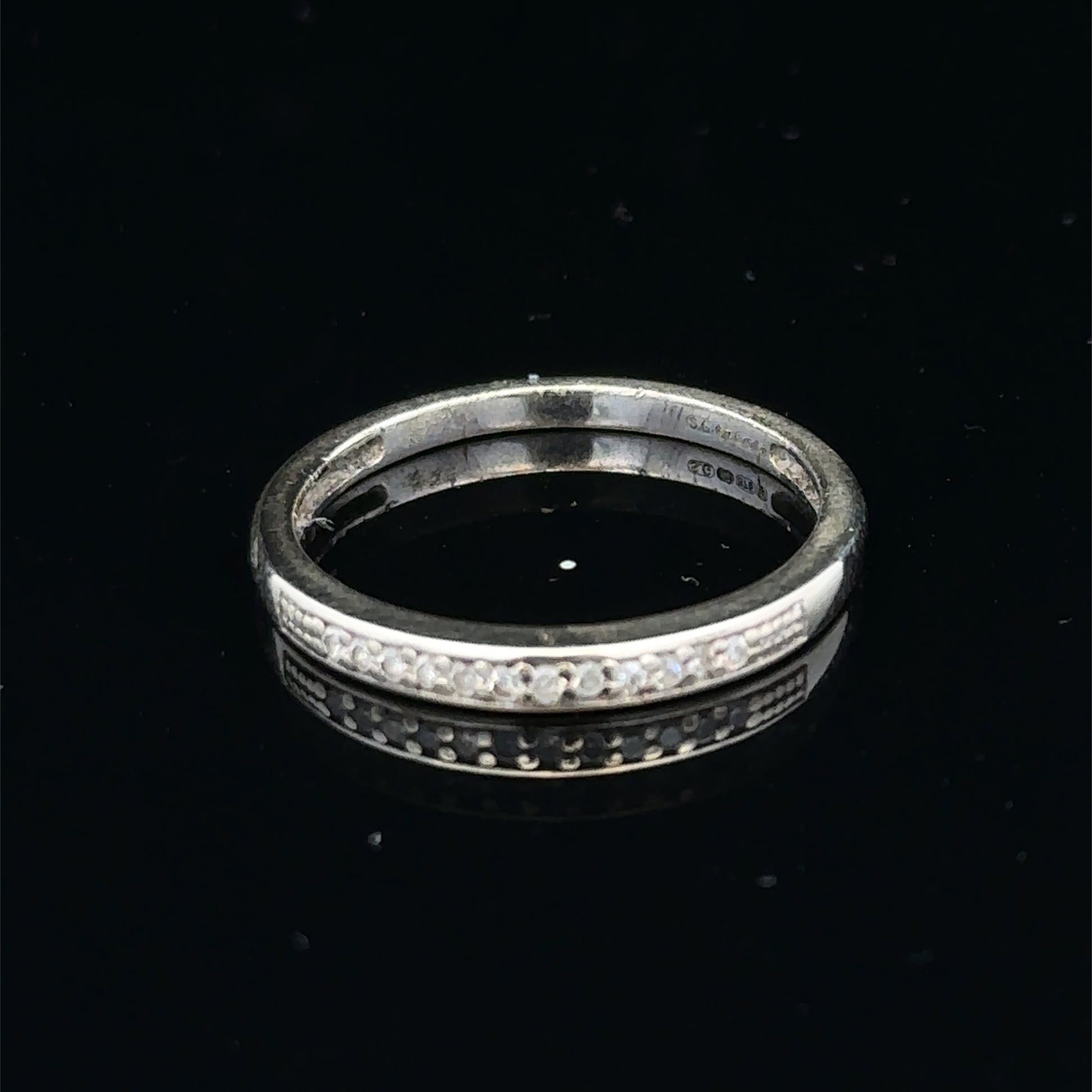 9ct white gold half eternity diamond ring with small sparkling diamonds, size N, by Reeves and Sons.